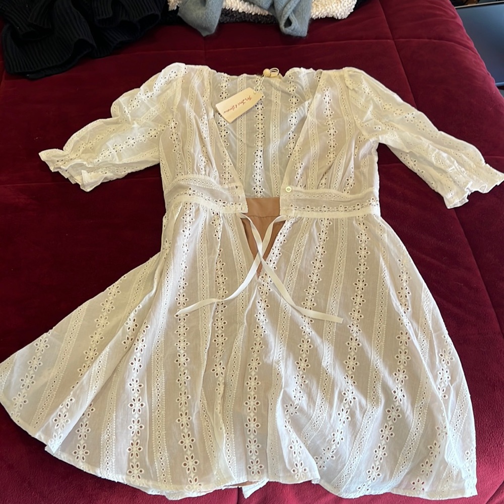 For love and lemons dress size small. Abit torn per photo but easily fixable